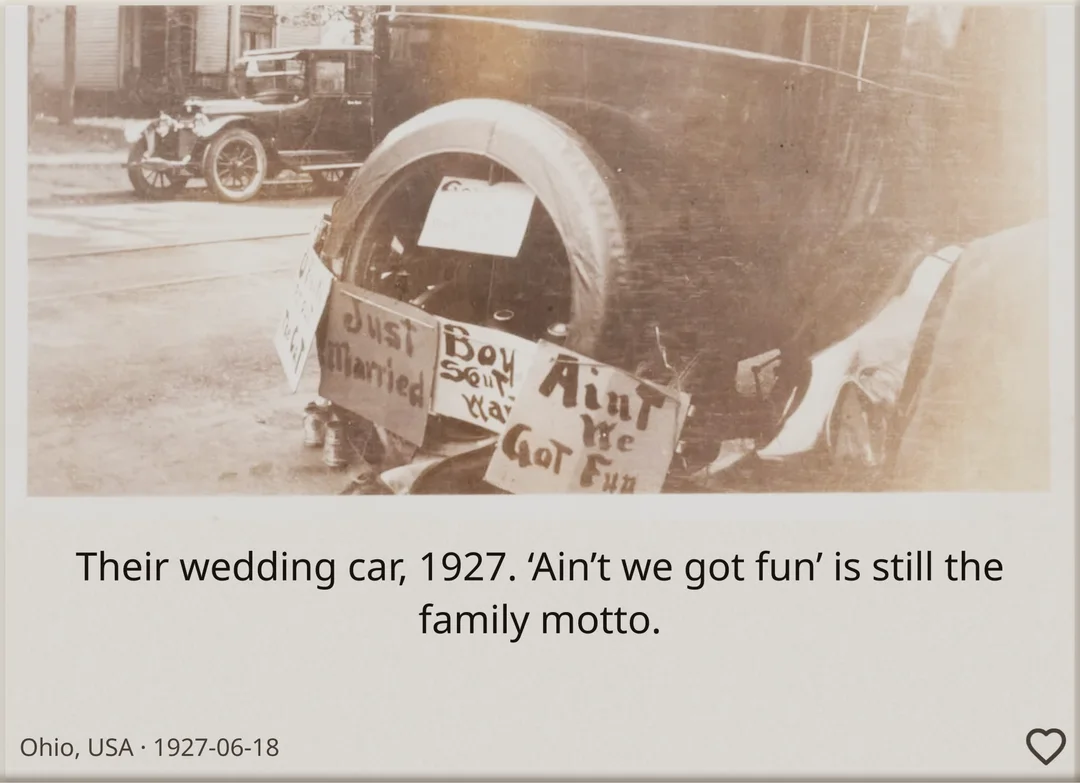 A brick with an old sepia photo of a 1920s car hung with “Just Married” signs: “Their wedding car, 1927. ‘Ain’t we got fun’ is still the family motto.”