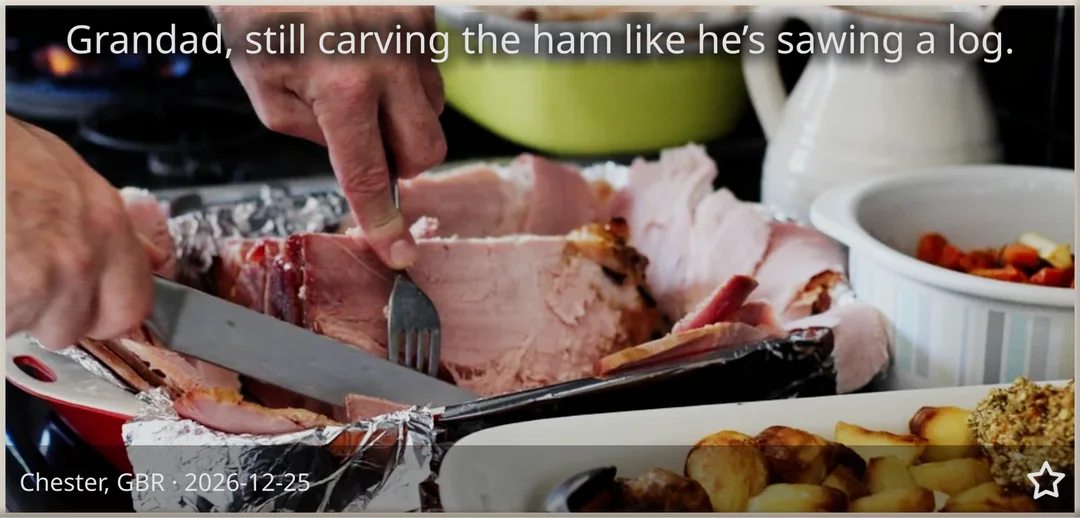 A brick with older hands carving the Christmas ham beside roast potatoes: “Grandad, still carving the ham like he’s sawing a log.”