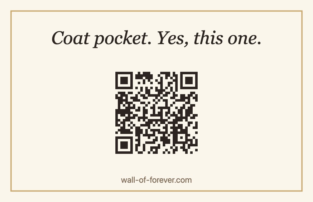 A small cream card with only a QR code and the words “Coat pocket. Yes, this one.”